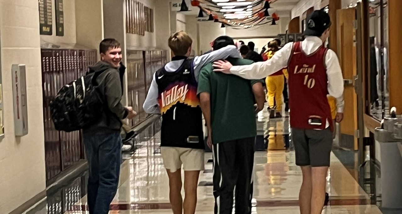 Boys Walking Hallway